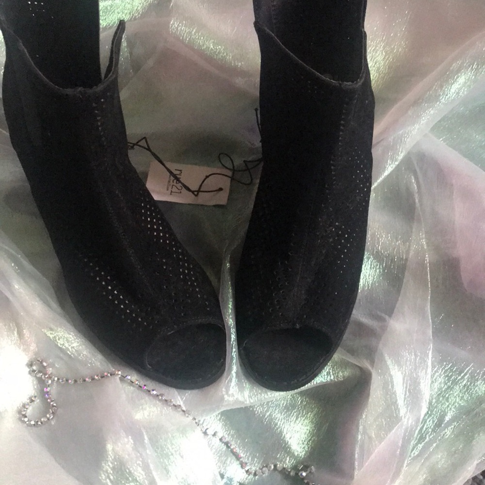 Black perforated peep toe booties